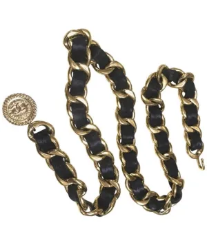 1980s Vintage CHANEL black leather thick chain belt with golden CC and mademoiselle charm. Nice and heavy single layer belt from CHANEL.