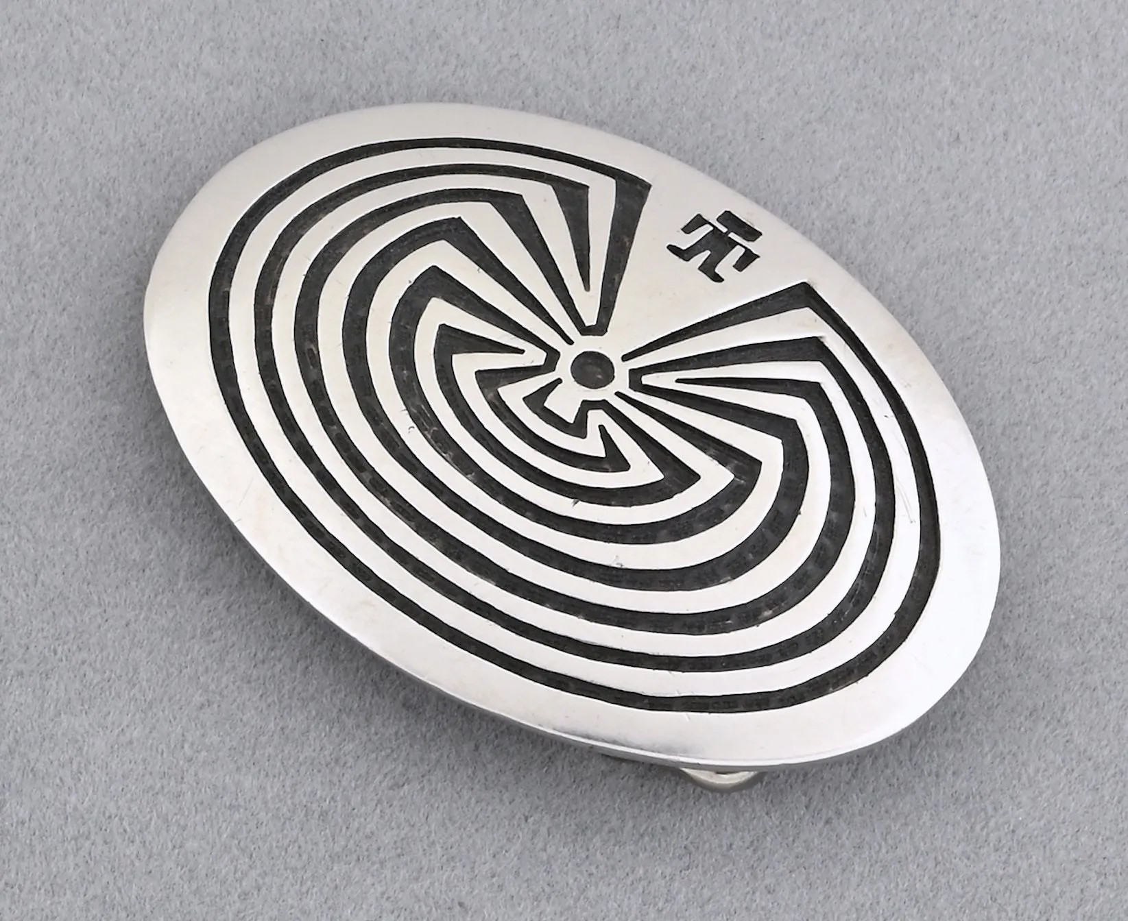 Belt Buckle with Man in the Maze by Alvin Sosolde (Pima)