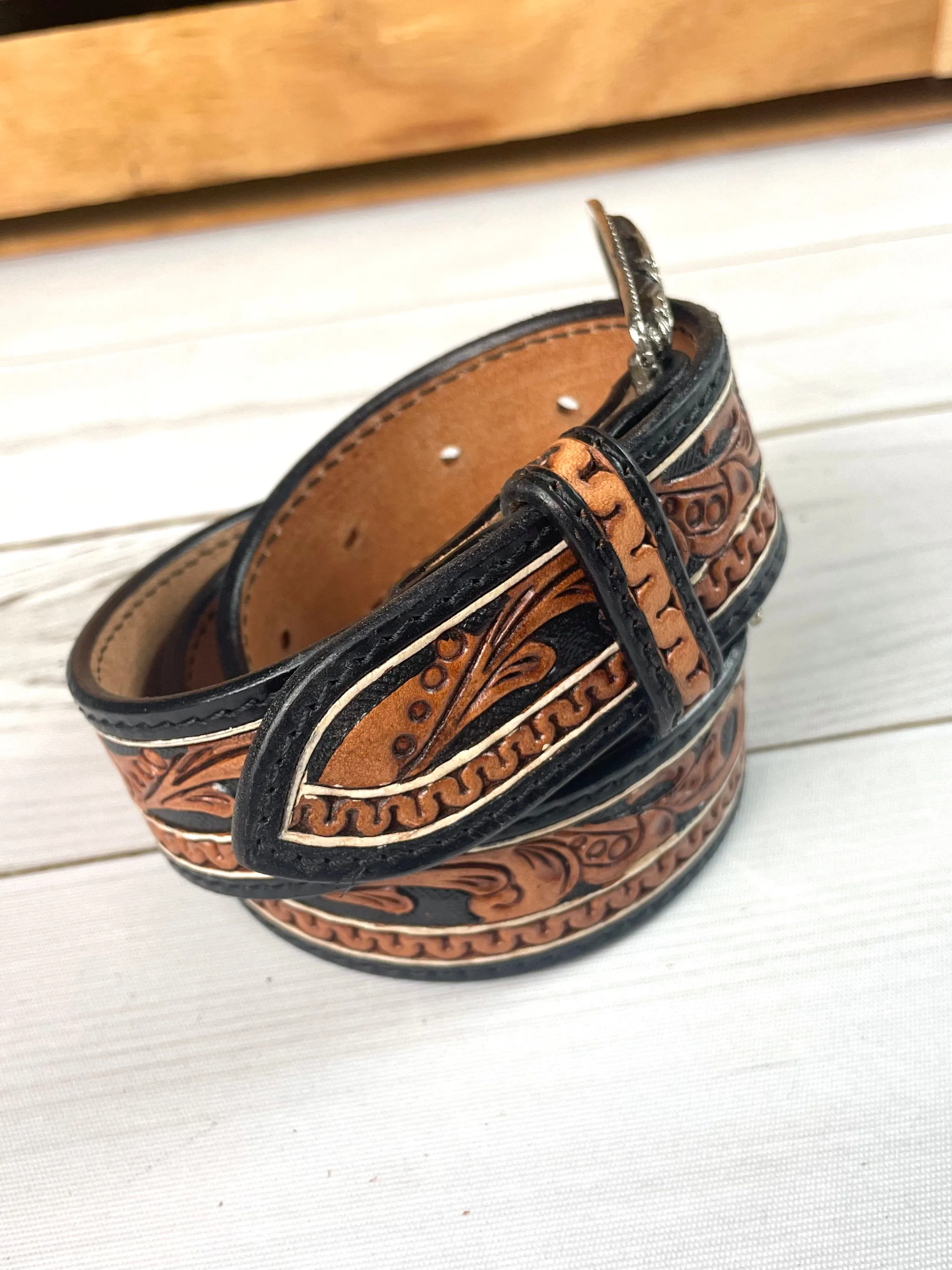 Black Border Tooled Leather Woman’s Belt