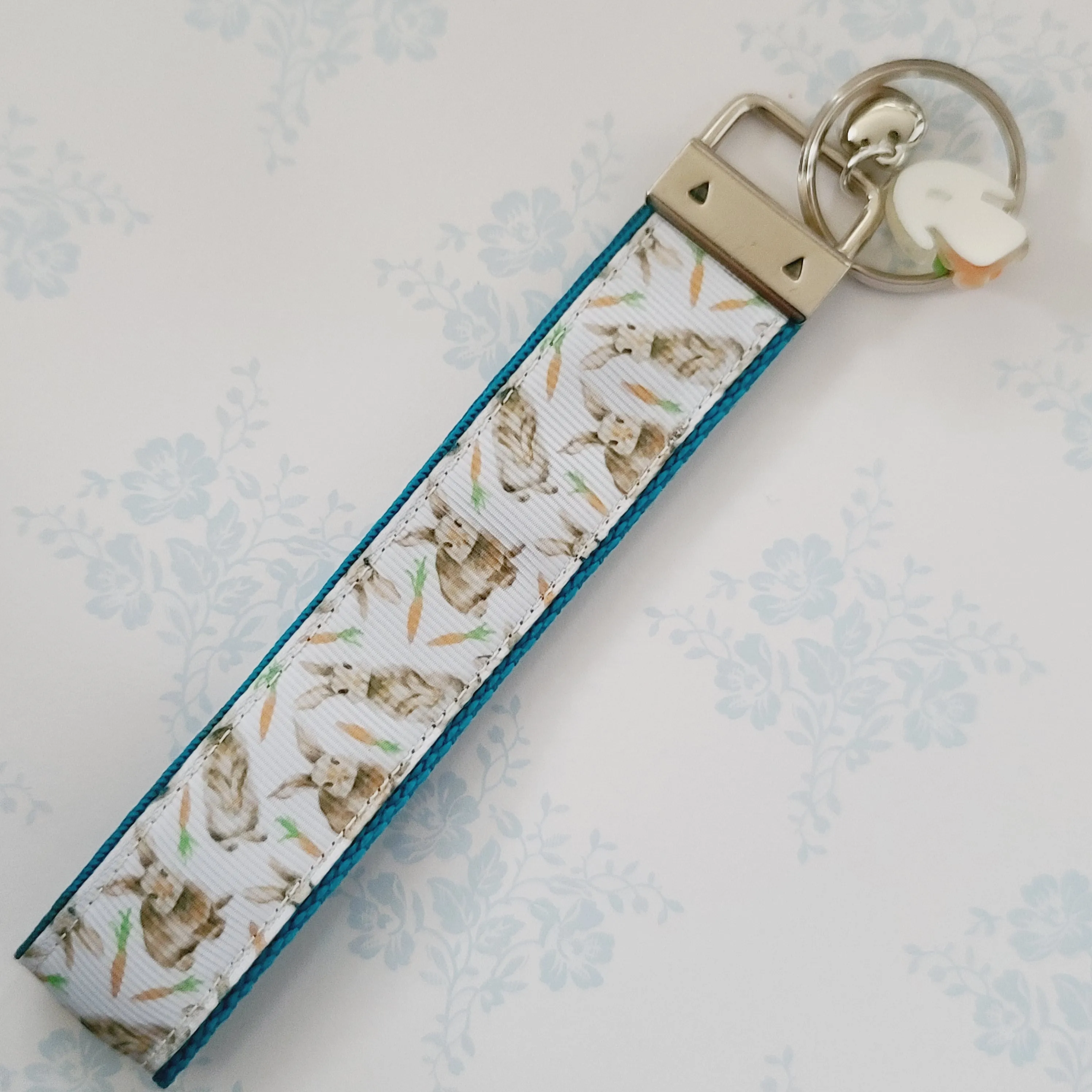 Bunnies with Carrots on White Key Fob Wristlet on Silver or Rainbow