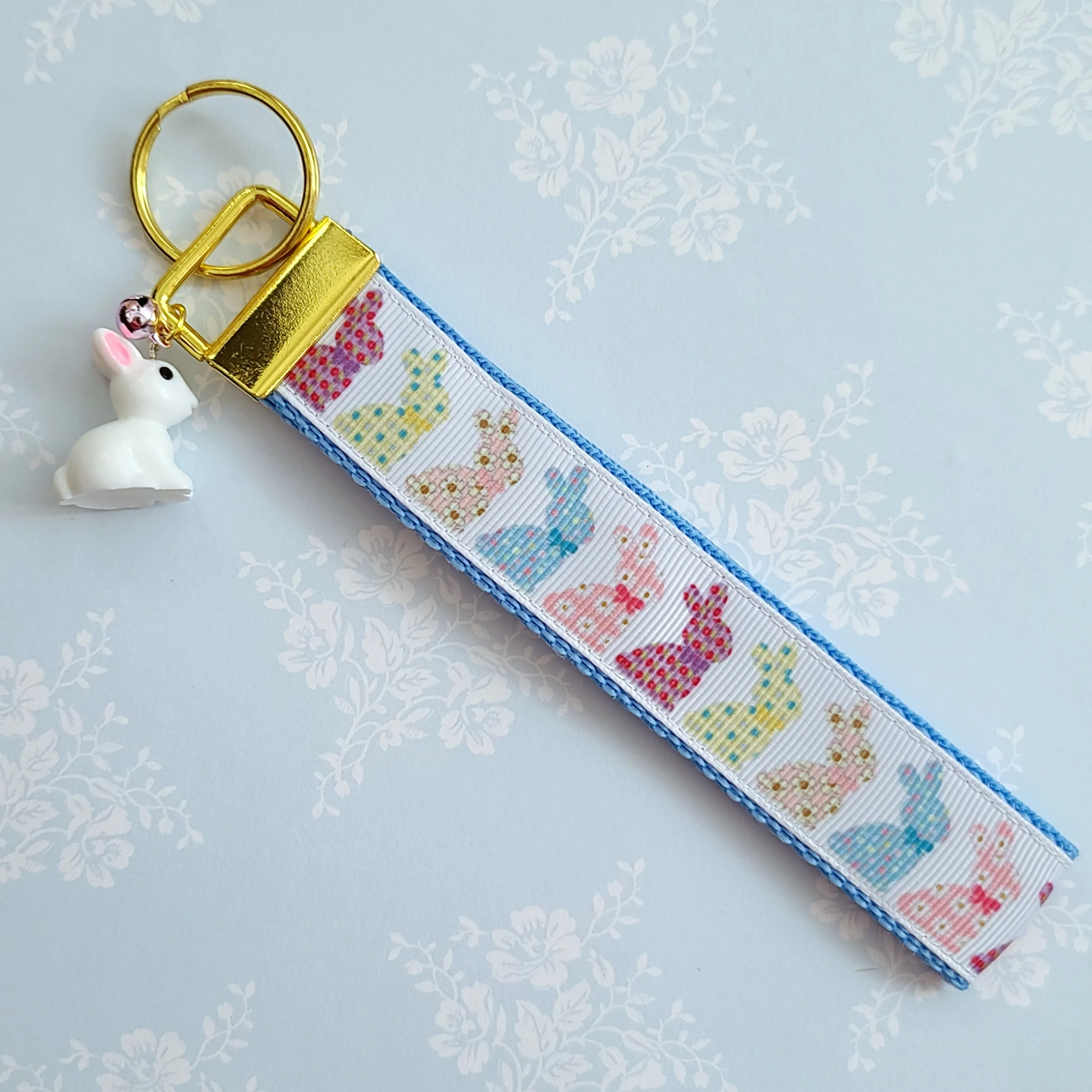 Bunnies with Patterns Key Chain Fob on Gold with Bunny Charm