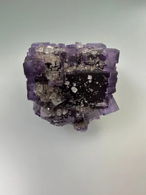 Calcite on Fluorite, Sub-Rosiclare Level, Bahama Pod, Denton Mine, Ozark-Mahoning Co., Harris Creek District, Southern Illinois, Mined c. 1992-1993, ex. Sam and Ann Koster Collection #00036, Miniature 3.3 x 3.5 x 4.2 cm, $450.  Online Dec. 19