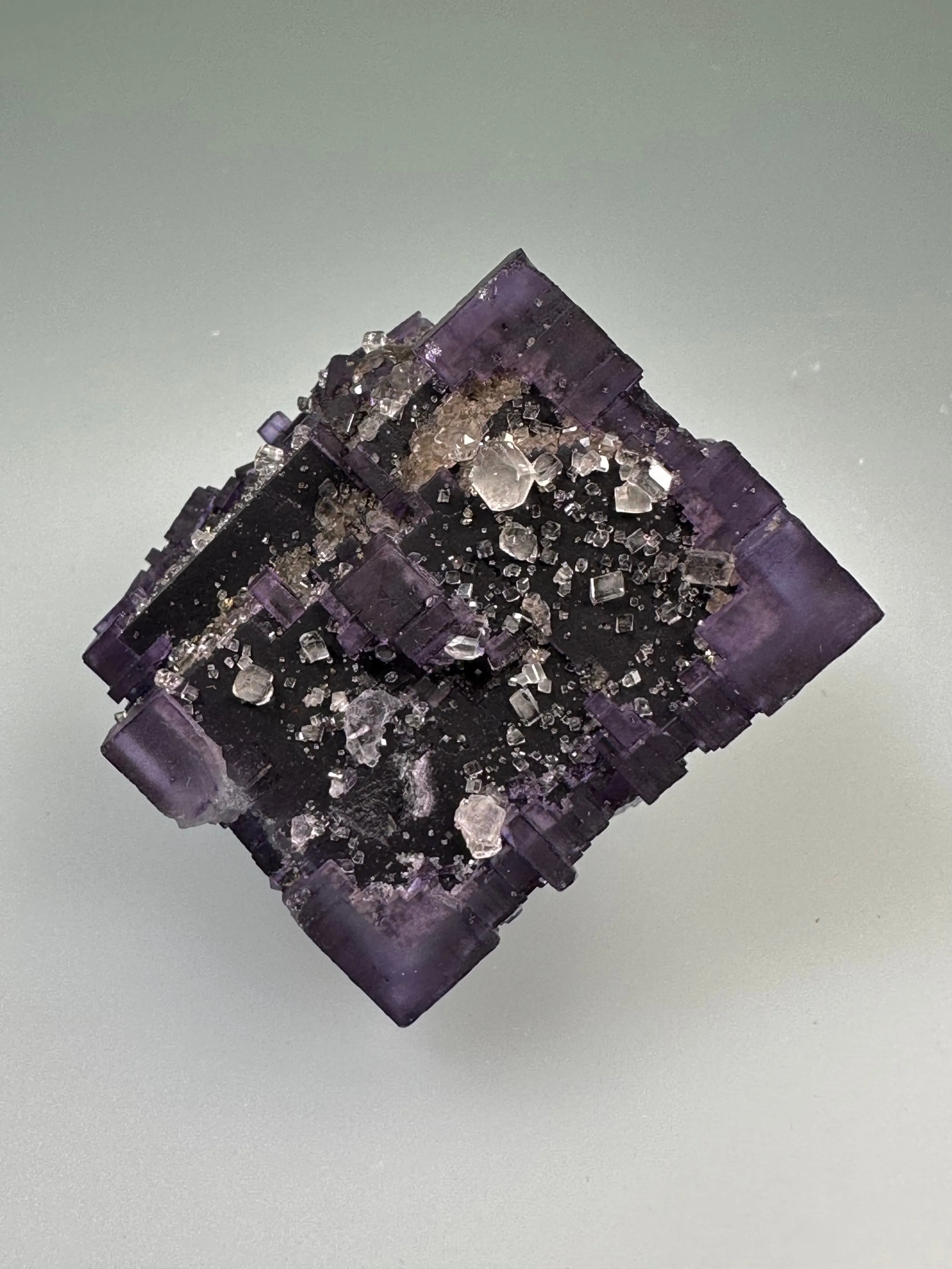 Calcite on Fluorite, Sub-Rosiclare Level, Bahama Pod, Denton Mine, Ozark-Mahoning Co., Harris Creek District, Southern Illinois, Mined c. 1992-1993, ex. Sam and Ann Koster Collection #00036, Miniature 3.3 x 3.5 x 4.2 cm, $450.  Online Dec. 19