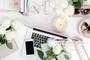 Feminine Workspace with Mint Green Notebook