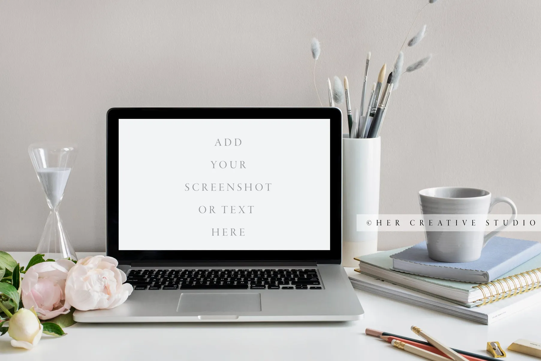 Laptop with Grey and Gold Desk Accessories. Stock Image