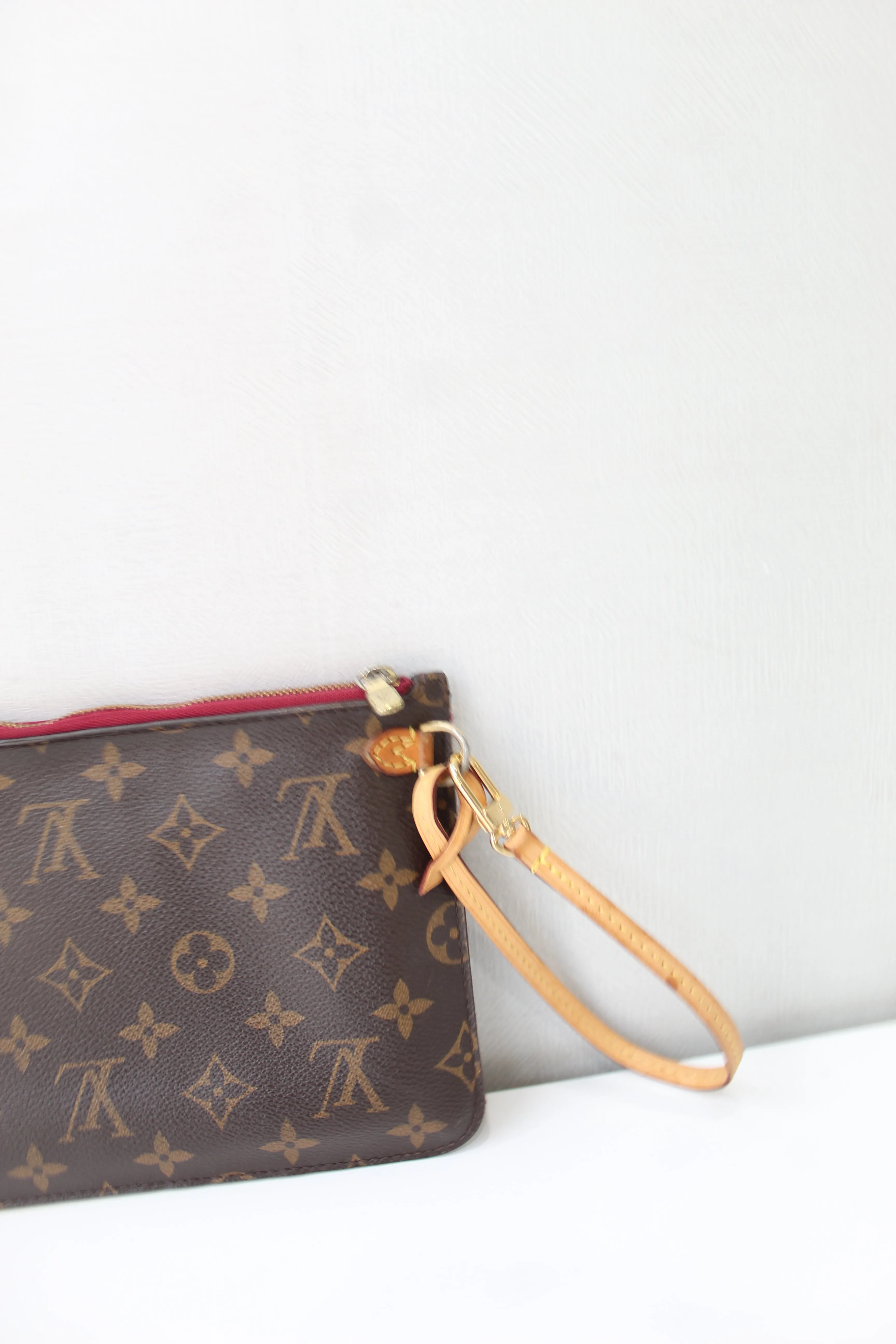 Louis Vuitton Neverfull Wristlet