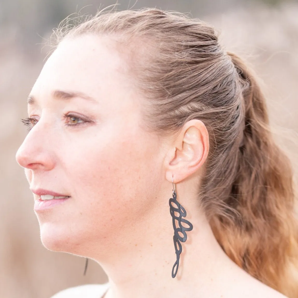 Passing Notes Rubber Earing