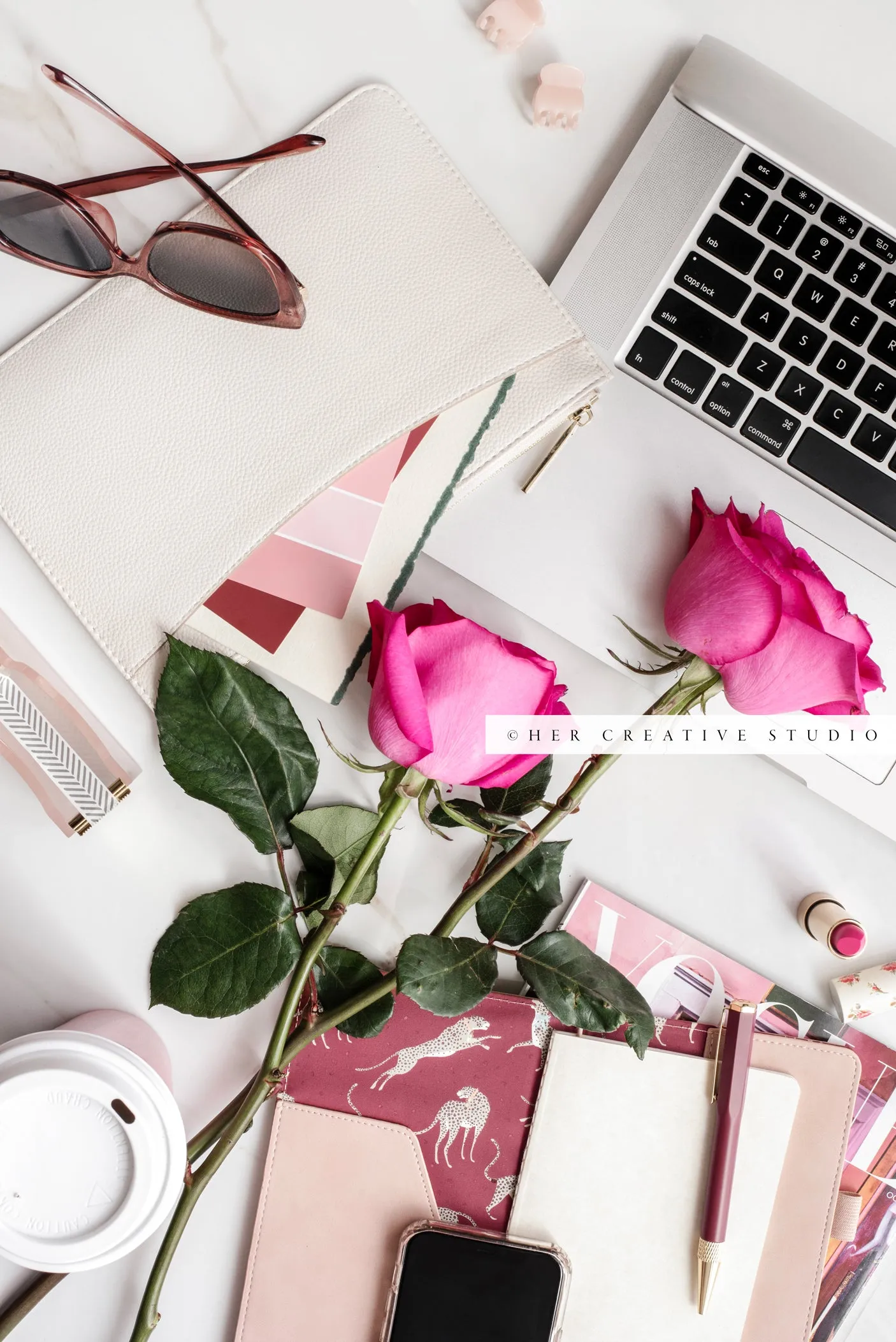 Pink Roses, Glasses and Laptop. Stock Photo