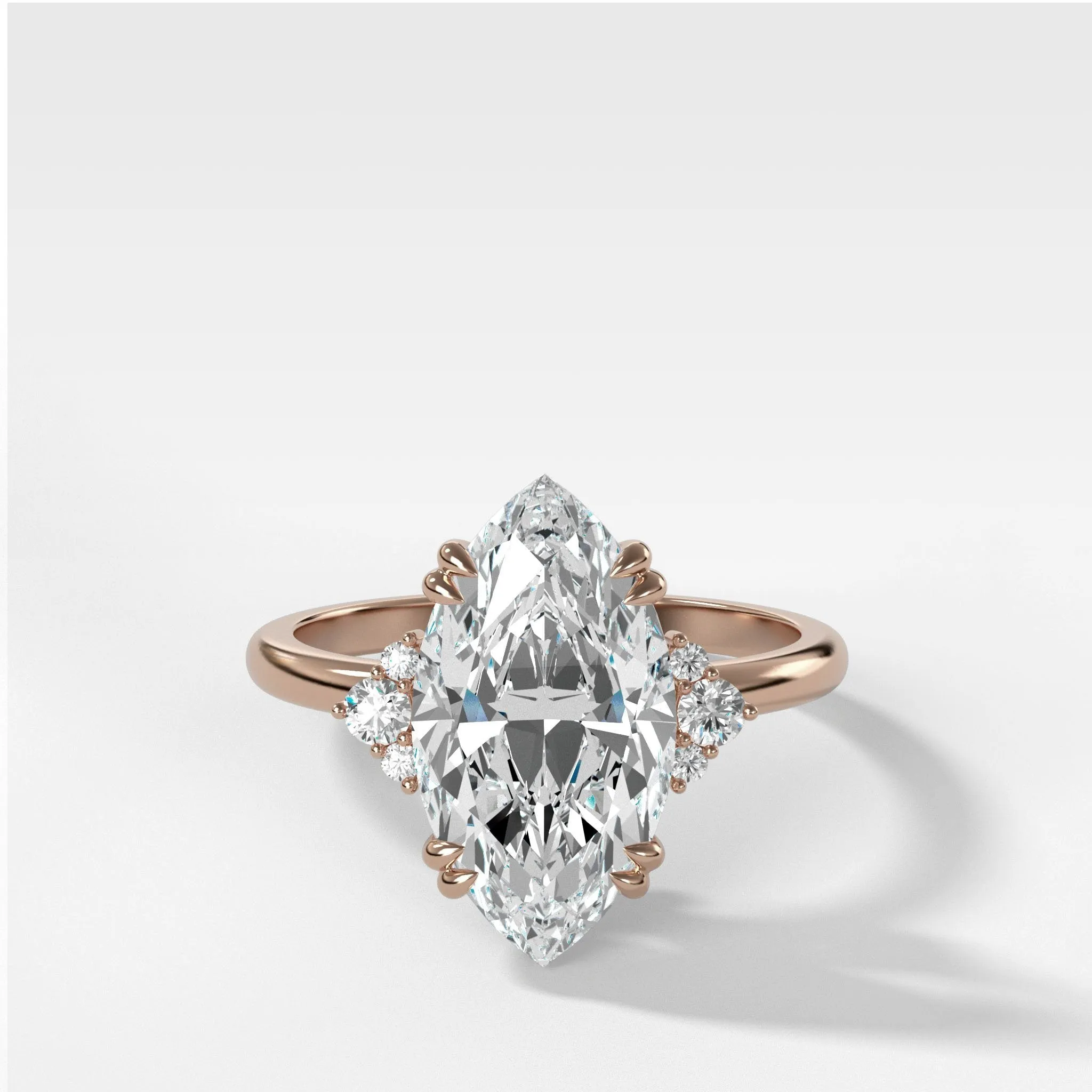Signature Cluster Engagement Ring With Marquise Cut Diamond