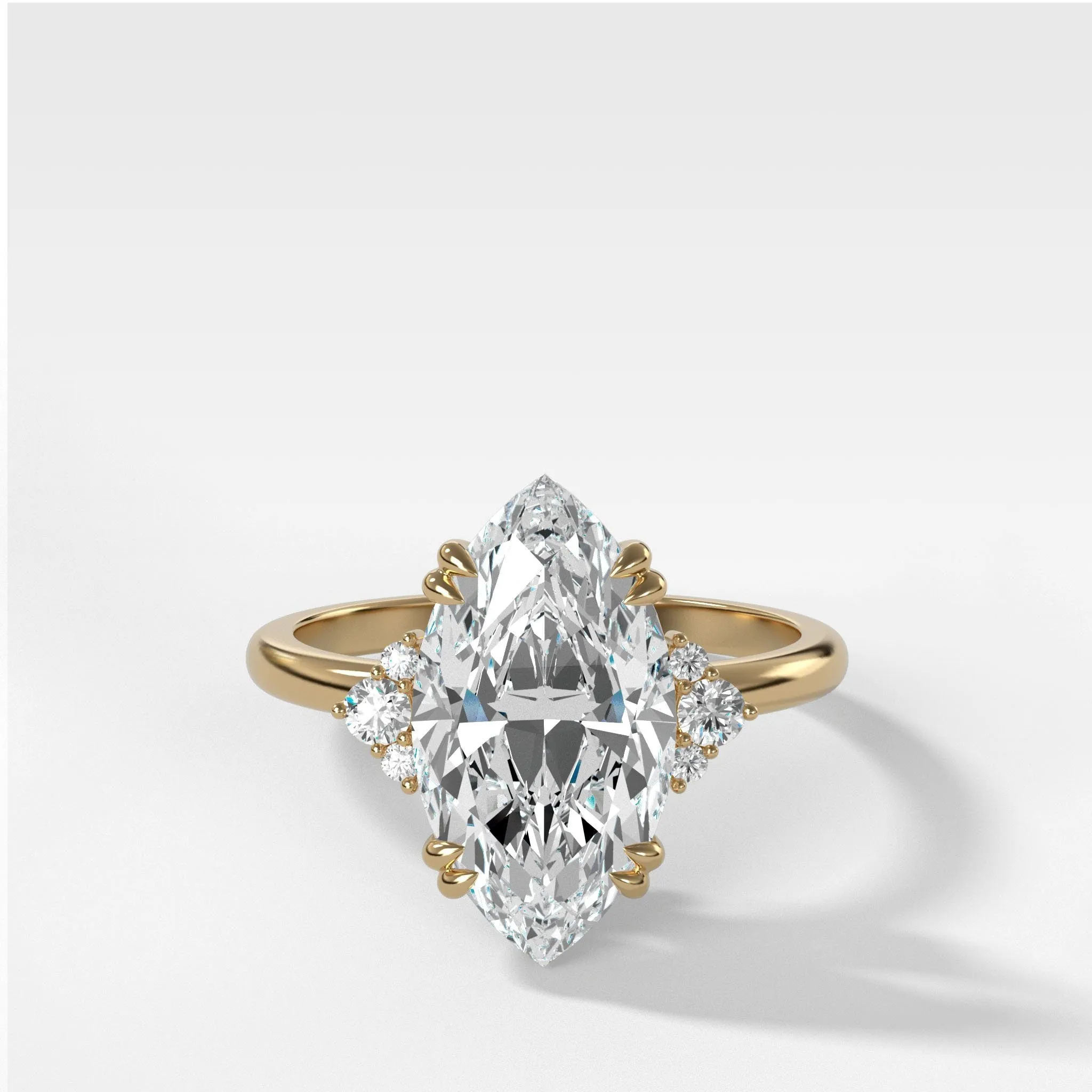 Signature Cluster Engagement Ring With Marquise Cut Diamond