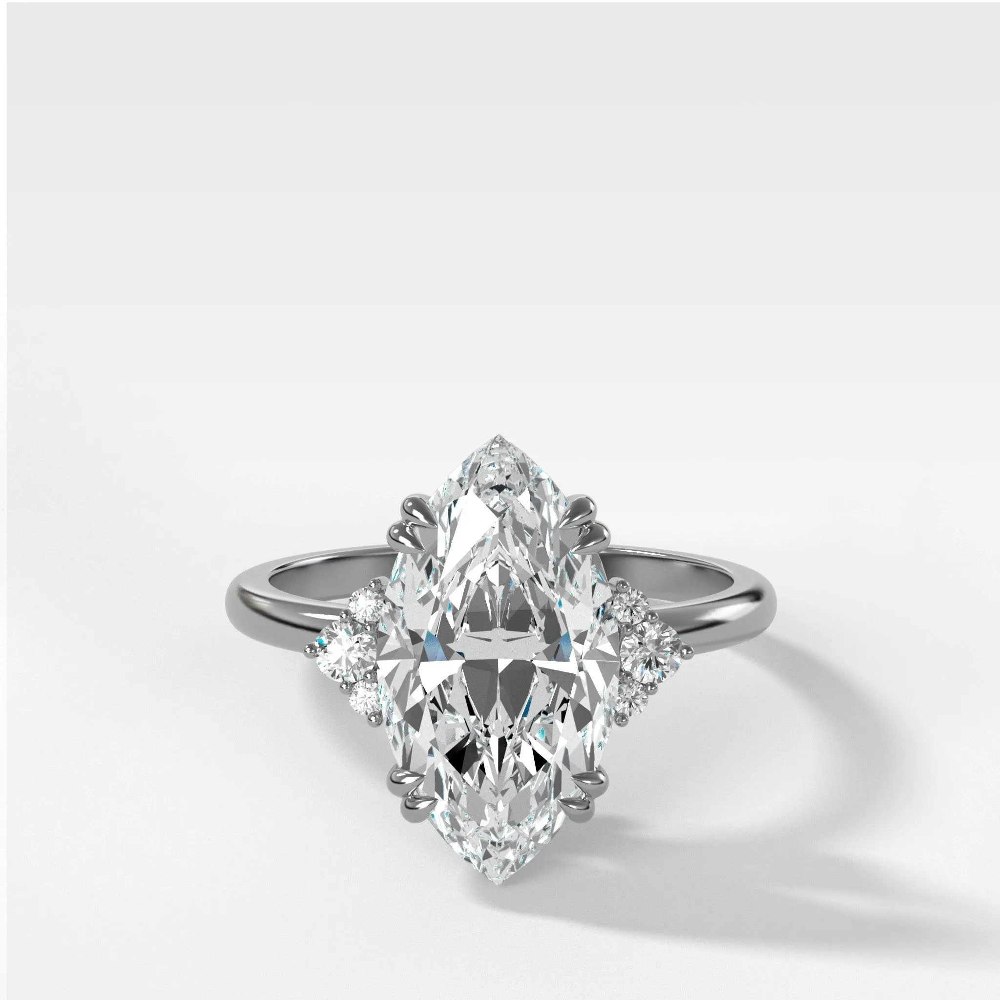 Signature Cluster Engagement Ring With Marquise Cut Diamond