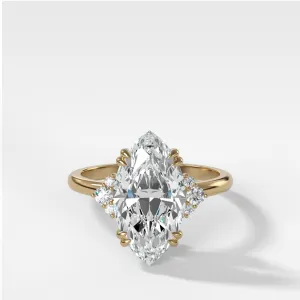 Signature Cluster Engagement Ring With Marquise Cut Diamond