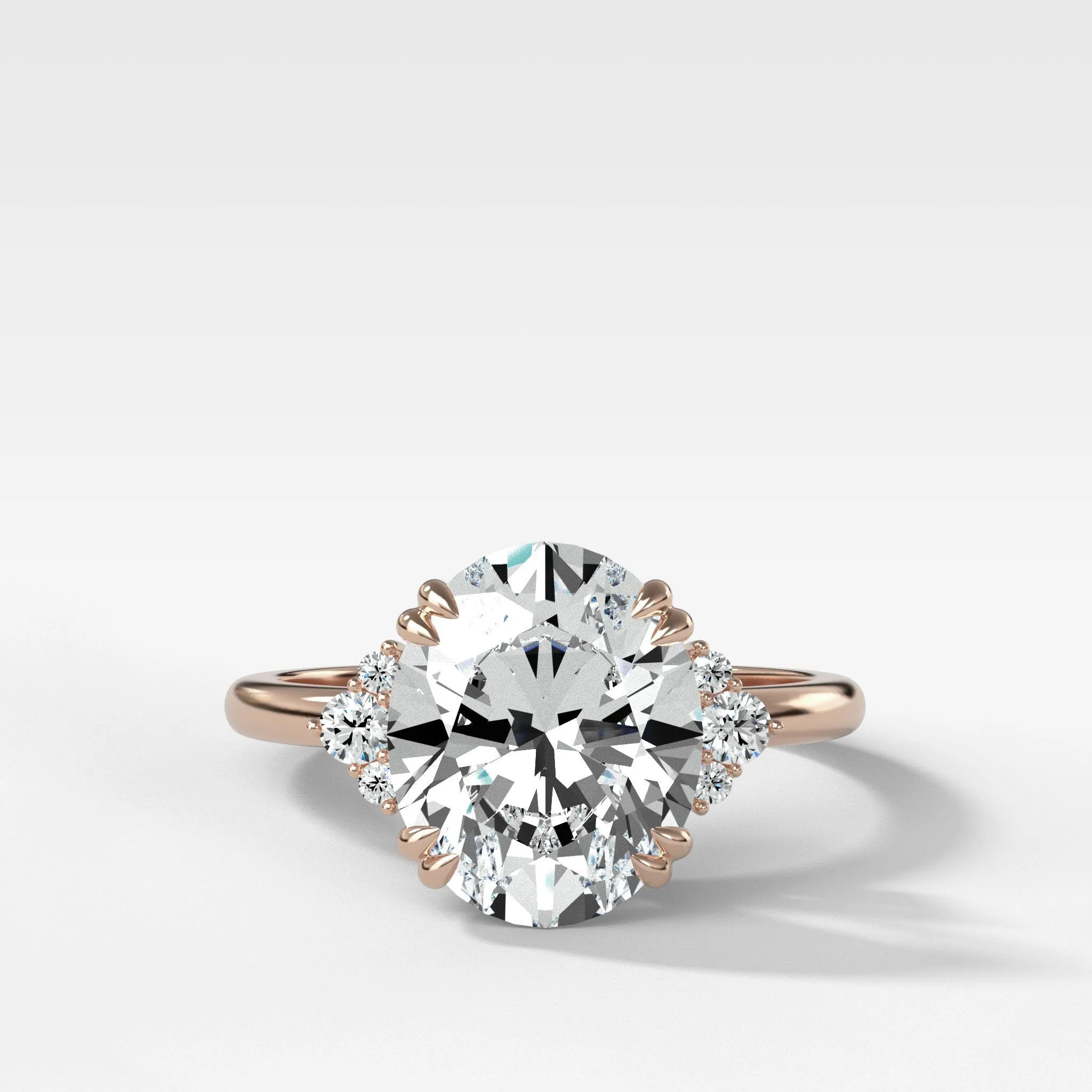 Signature Cluster Engagement Ring With Oval Cut Diamond