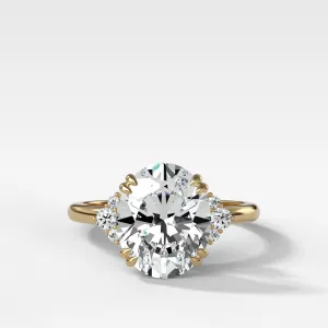 Signature Cluster Engagement Ring With Oval Cut Diamond