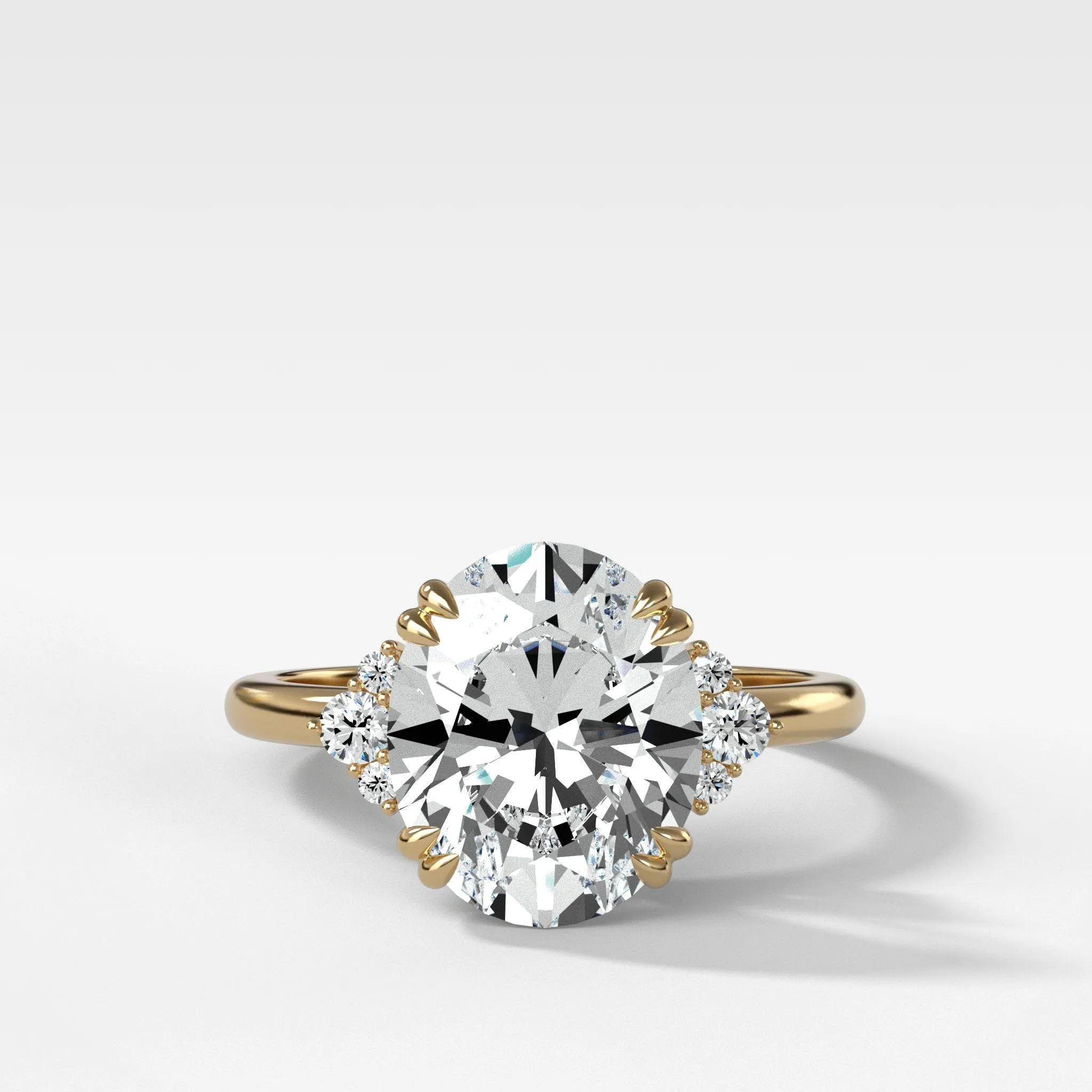 Signature Cluster Engagement Ring With Oval Cut Diamond