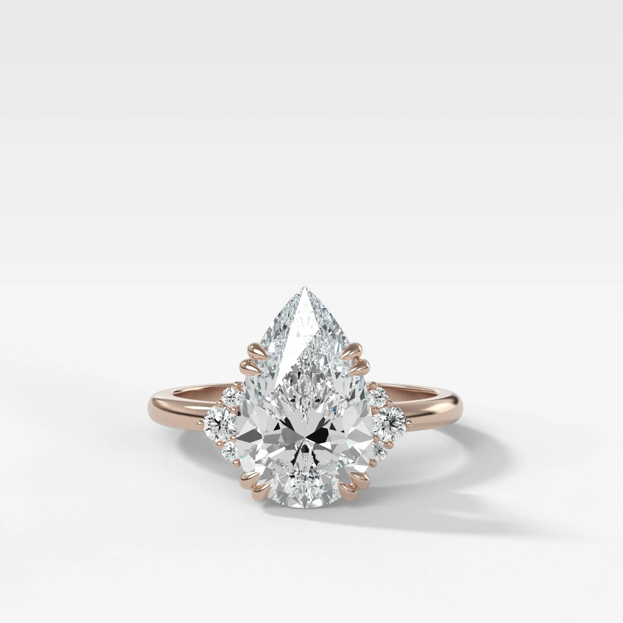 Signature Cluster Engagement Ring With Pear Cut Diamond