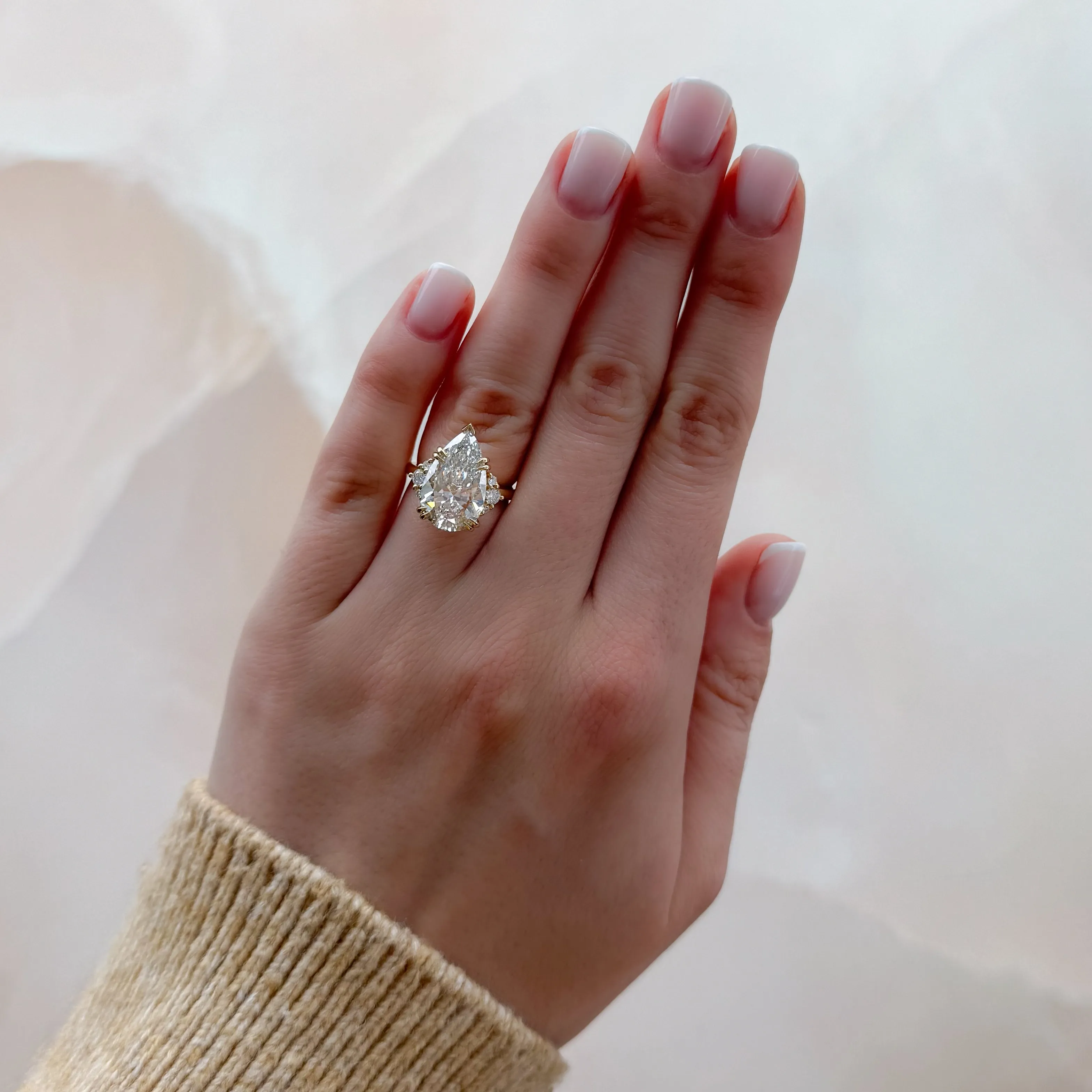 Signature Cluster Engagement Ring With Pear Cut Diamond