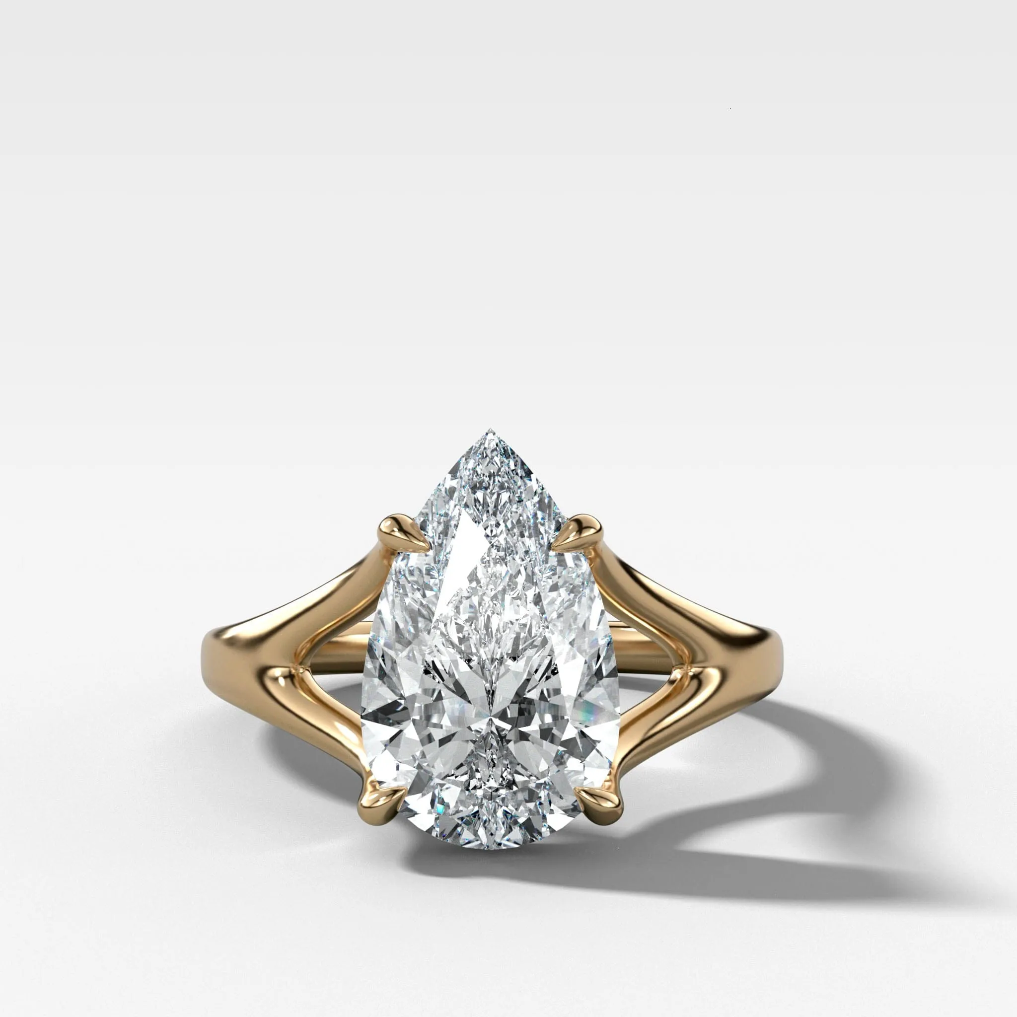 Split Shank Solitaire Engagement Ring with Pear Cut Diamond