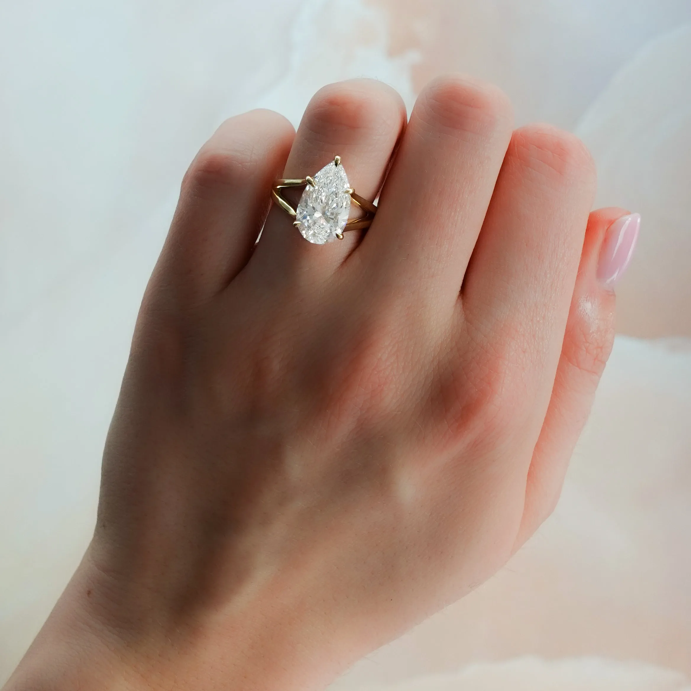Split Shank Solitaire Engagement Ring with Pear Cut Diamond