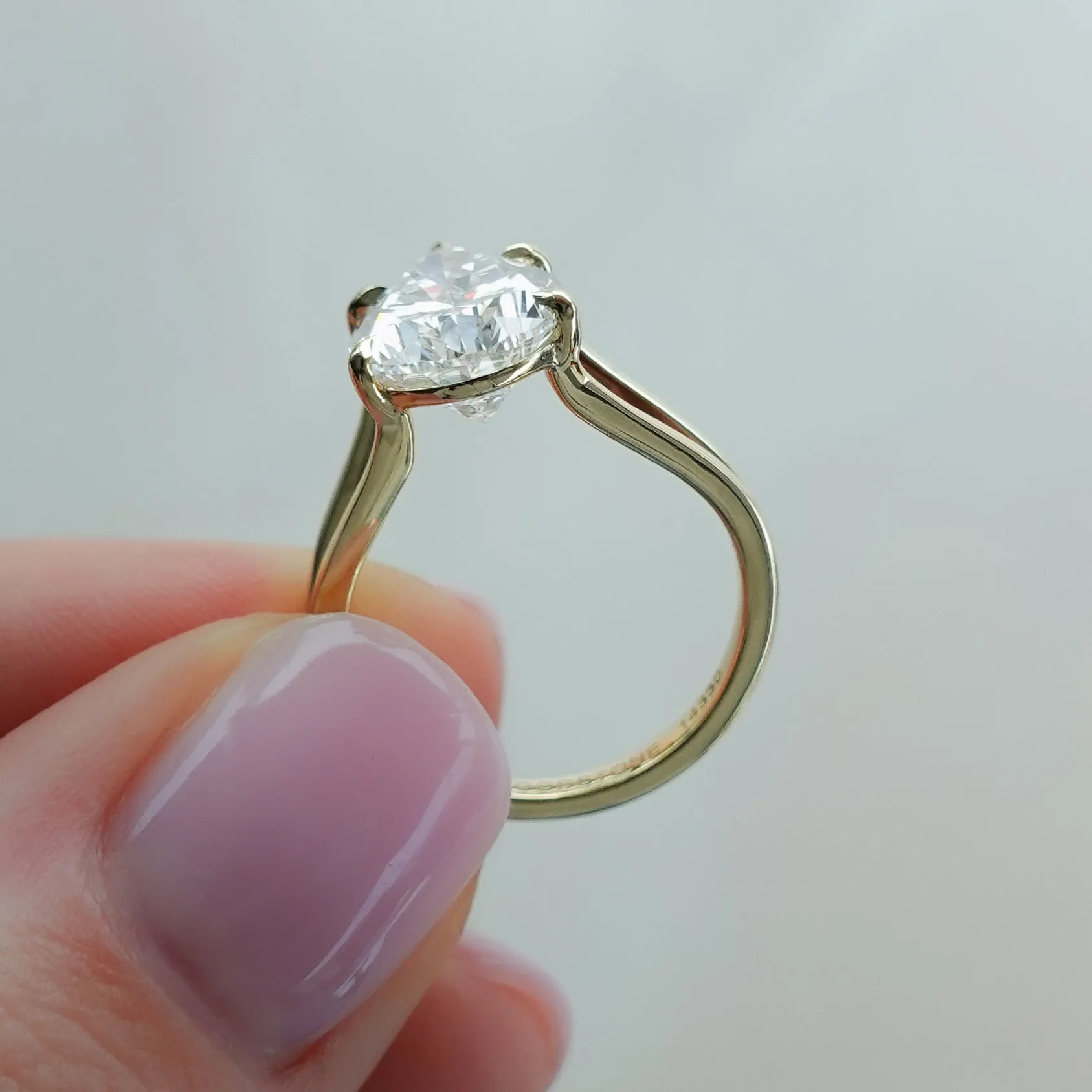 Split Shank Solitaire Engagement Ring with Pear Cut Diamond